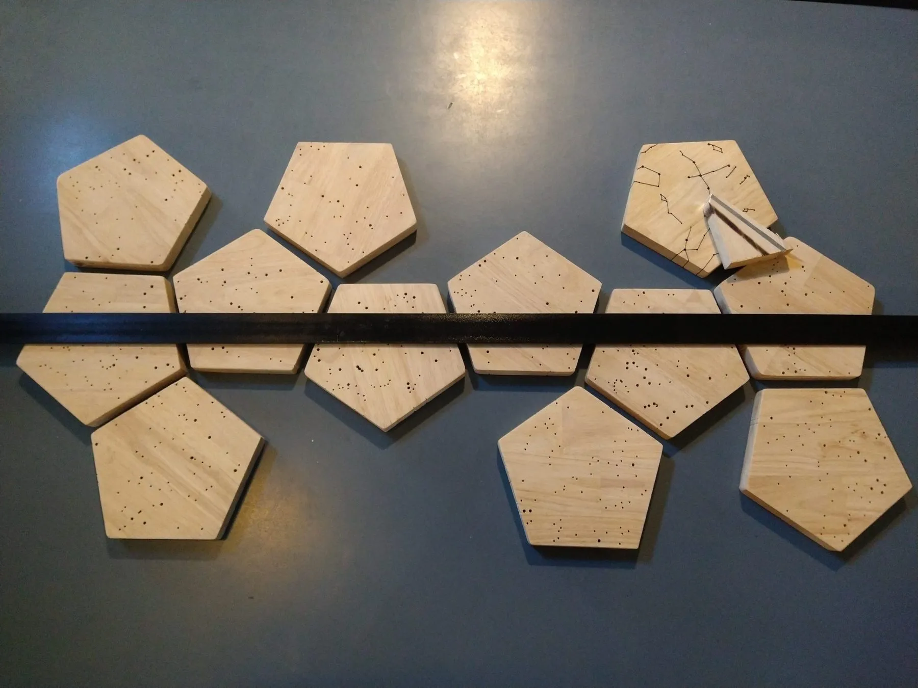 The full ring of pentagons laid out on the floor